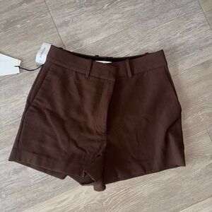 Aritzia 
Babaton Agency Mini Short in Coffee Bean (Brown)
Size M